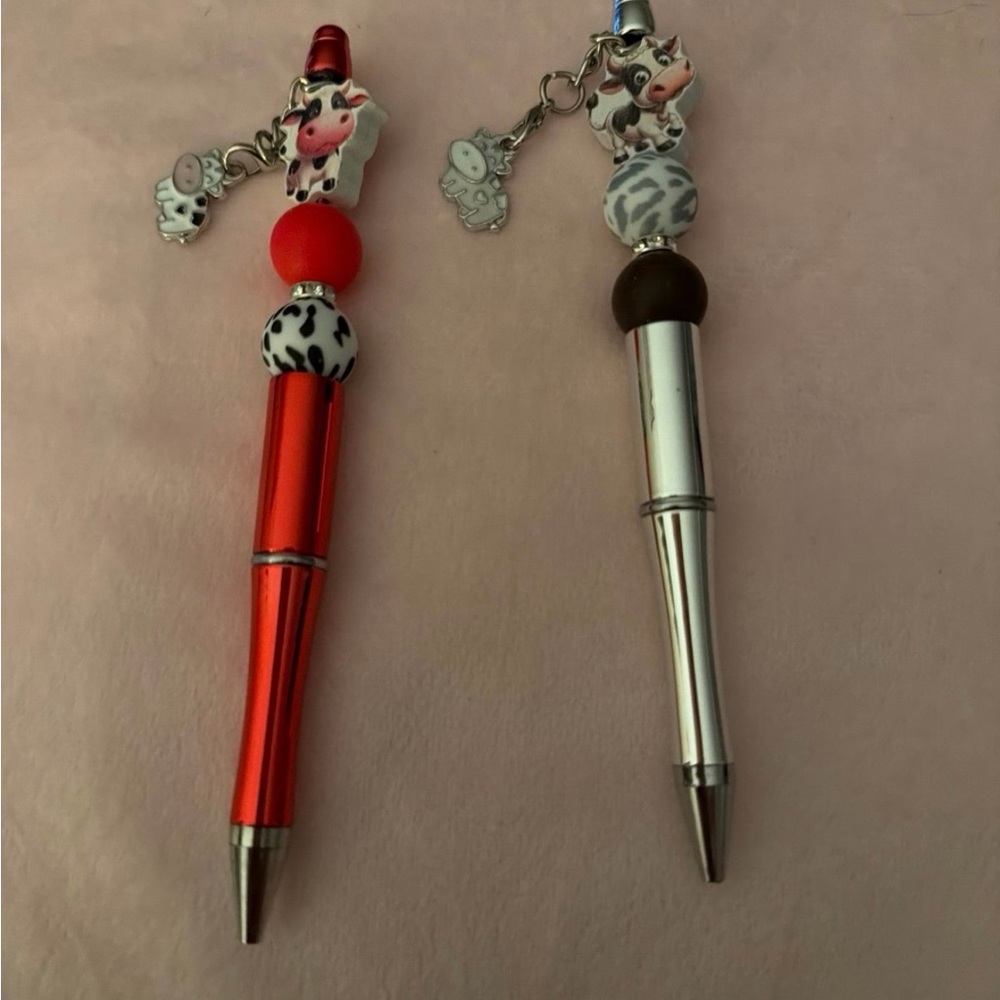 Red and Silver Novelty Pens with Animal Charms